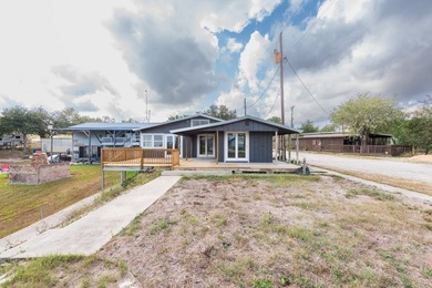 RENOVATED AND MOVE-IN READY WATERFRONT HOME AT LAKE CORPUS - photo 1