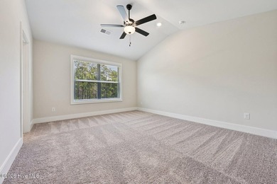 AVAILABLE NOW! This charming three-bedroom - photo 12