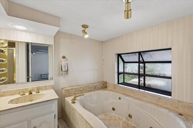 Enjoy lakefront living in this 3-bedroom, 2-bath home located in - photo 13