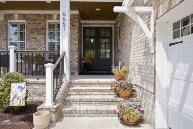 Welcome to this beautifully crafted home where brick and stone - photo 6