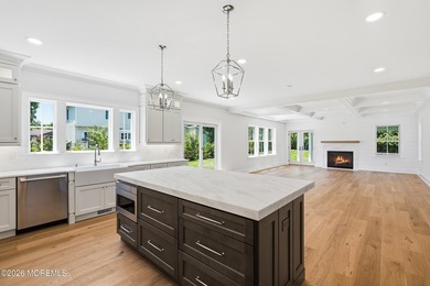 Experience exceptional luxury in this custom-built luxury - photo 12