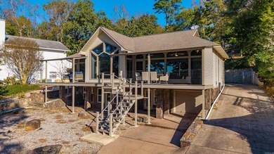 Sweeping Lake Greeson views from this custom-built retreat on a - photo 45