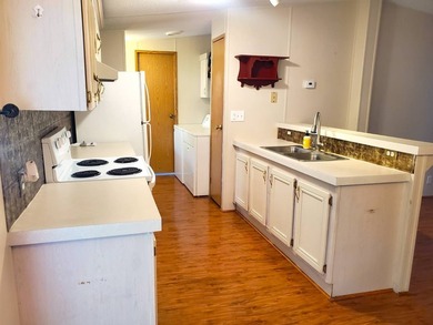 THIS HOME IS ON LEASED LAND WITH A MONTHLY LOT RENT OF $632 AND - photo 8