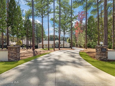Welcome to this custom lakefront home on Lake Auman, where the - photo 1