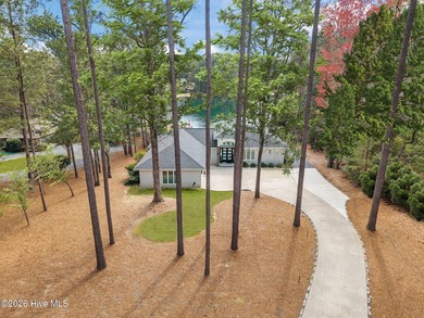 Welcome to this custom lakefront home on Lake Auman, where the - photo 2