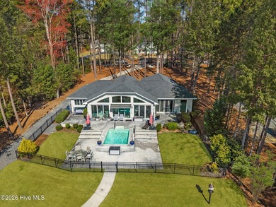 Welcome to this custom lakefront home on Lake Auman, where the - photo 4