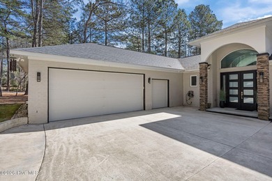 Welcome to this custom lakefront home on Lake Auman, where the - photo 6