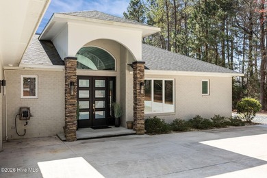 Welcome to this custom lakefront home on Lake Auman, where the - photo 7