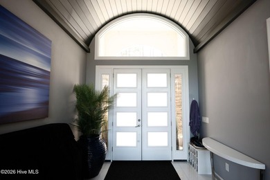 Welcome to this custom lakefront home on Lake Auman, where the - photo 9