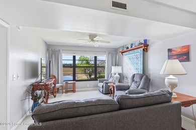 This beautifully updated 2bedroom 2bath condo offers serene pond - photo 3