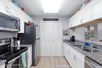 This beautifully updated 2bedroom 2bath condo offers serene pond - photo 7