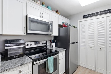 This beautifully updated 2bedroom 2bath condo offers serene pond - photo 8