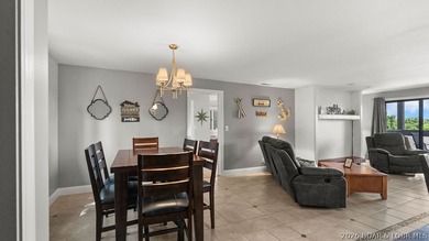 Turnkey Lakefront Living with a Dock Slip Included! Discover - photo 11
