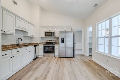 ** THIS HOME IS A MUST SEE WITH LOTS OF UPDATES! Welcome home to - photo 11