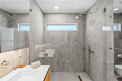 Step into this tastefully fully renovated 4 bedroom, 3.5 - photo 17