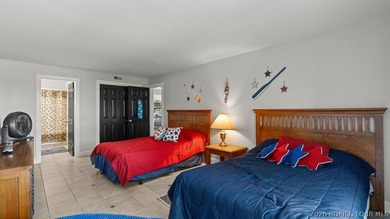 Turnkey Lakefront Living with a Dock Slip Included! Discover - photo 20