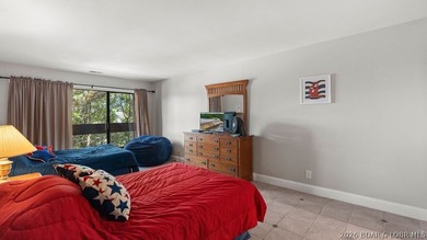 Turnkey Lakefront Living with a Dock Slip Included! Discover - photo 21