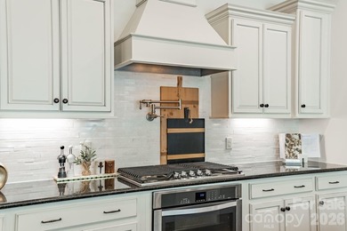 Stunning 5-bedroom, 4 full bath, 2 half bath home in the coveted - photo 7