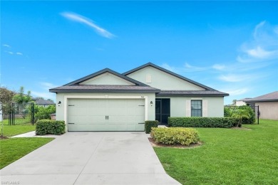 Lake Home For Sale in Lehigh Acres, Florida