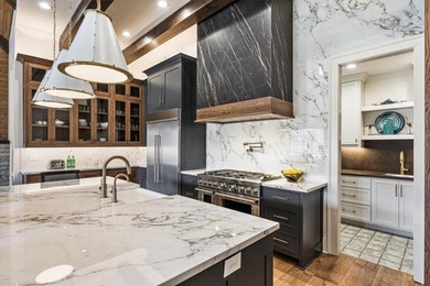 Experience refined mountain living in this custom-built - photo 36