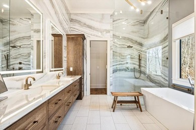 Experience refined mountain living in this custom-built - photo 47