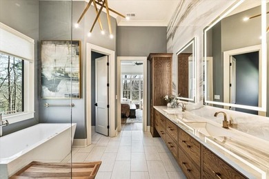 Experience refined mountain living in this custom-built - photo 48