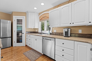 Lake living starts here! Nestled in the heart of Delafield, this - photo 9