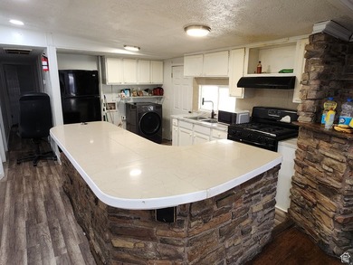 This home is a must see! Custom built Home bar is ready for all - photo 4