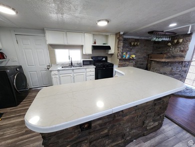 This home is a must see! Custom built Home bar is ready for all - photo 5