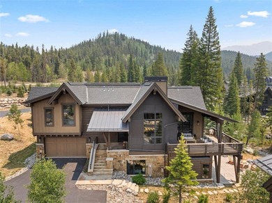 This immaculately maintained riverfront mountain residence is - photo 1