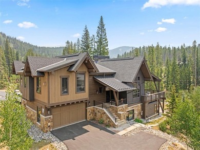 This immaculately maintained riverfront mountain residence is - photo 2