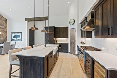 This immaculately maintained riverfront mountain residence is - photo 9