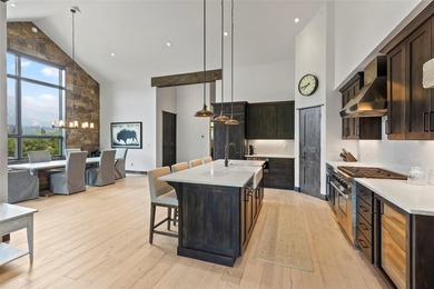 This immaculately maintained riverfront mountain residence is - photo 10
