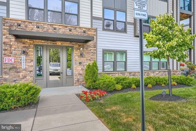 Welcome to 10411 Resort Road, Unit V, nestled in the highly - photo 3