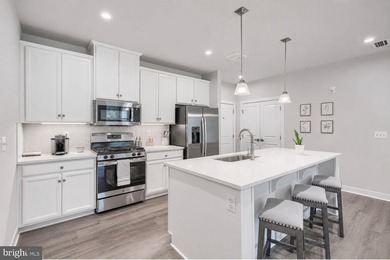 Welcome to 10411 Resort Road, Unit V, nestled in the highly - photo 4