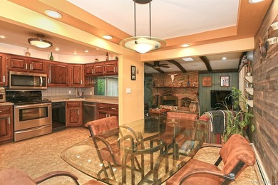Charming Center-Hall Cape Cod Nestled on Serene Tree-Lined - photo 11