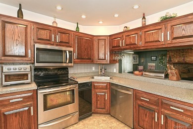 Charming Center-Hall Cape Cod Nestled on Serene Tree-Lined - photo 12