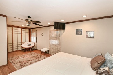 Charming Center-Hall Cape Cod Nestled on Serene Tree-Lined - photo 17