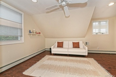 Charming Center-Hall Cape Cod Nestled on Serene Tree-Lined - photo 19