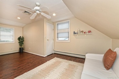 Charming Center-Hall Cape Cod Nestled on Serene Tree-Lined - photo 20