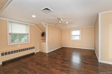 Charming Center-Hall Cape Cod Nestled on Serene Tree-Lined - photo 21