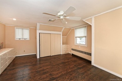 Charming Center-Hall Cape Cod Nestled on Serene Tree-Lined - photo 22