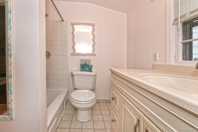 Charming Center-Hall Cape Cod Nestled on Serene Tree-Lined - photo 23