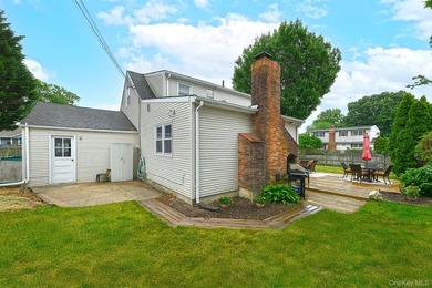 Charming Center-Hall Cape Cod Nestled on Serene Tree-Lined - photo 32