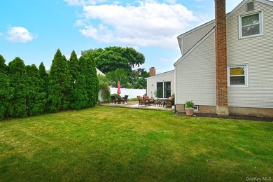 Charming Center-Hall Cape Cod Nestled on Serene Tree-Lined - photo 33