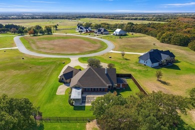 Welcome to this impressive custom home in the gated Texoma - photo 34