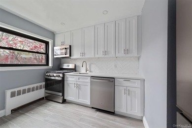 Welcome to this charming garden-style co-op located in the heart - photo 16