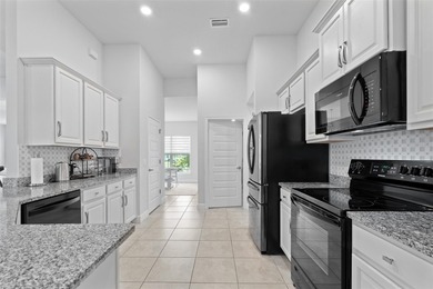 Welcome home! This meticulously maintained 4-bedroom, 2-bathroom - photo 14