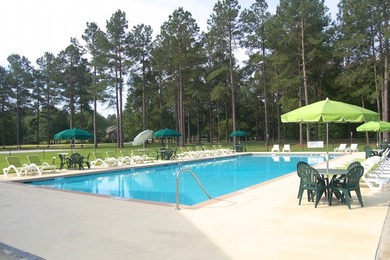Corner, cul-de-sac lot located in a gated, lakeside, golf course - photo 7