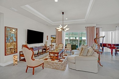 This stunning corner-lot home offers breathtaking lake views and - photo 4